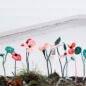 Fleur en laine coquelicot